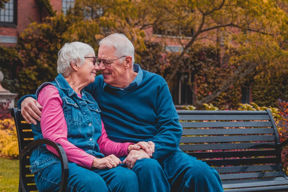 Elderly couple sitting elder client